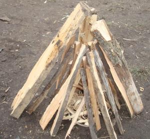 How can you safely make a fire in a teepee?